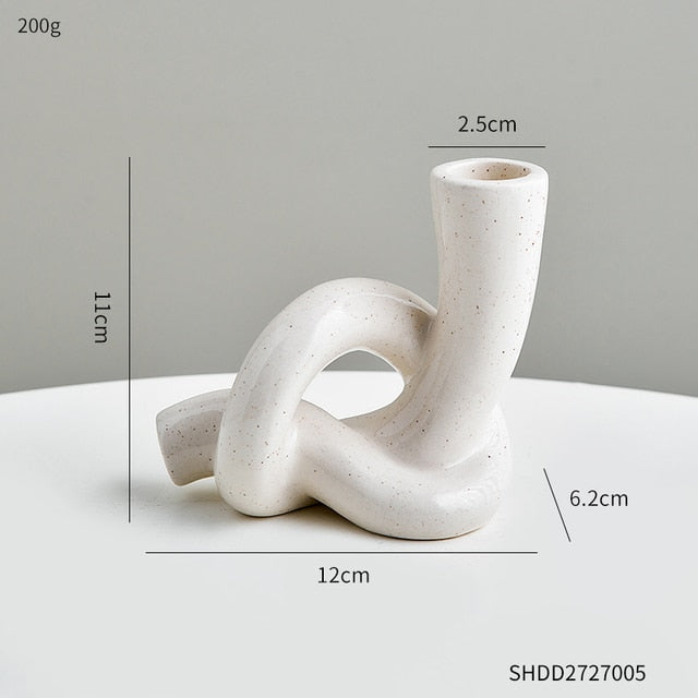 Serpentine candle holder