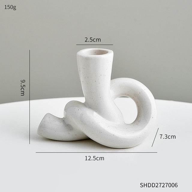 Serpentine candle holder