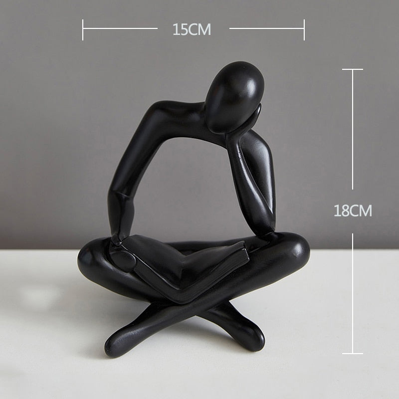 Miniatura de estatua de pensador abstracto