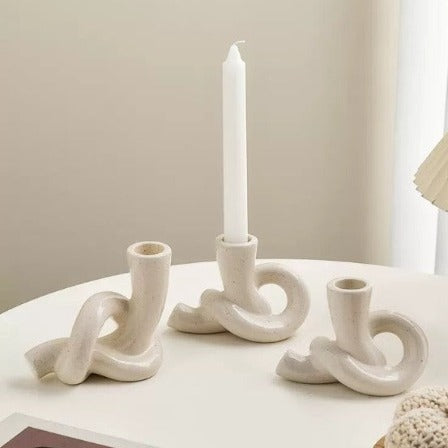 Serpentine candle holder